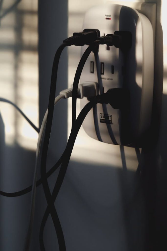 Crafting Captivating Headlines: Your awesome post title goes here Multiple charging cables plugged into a wall outlet, showcasing energy connectivity.